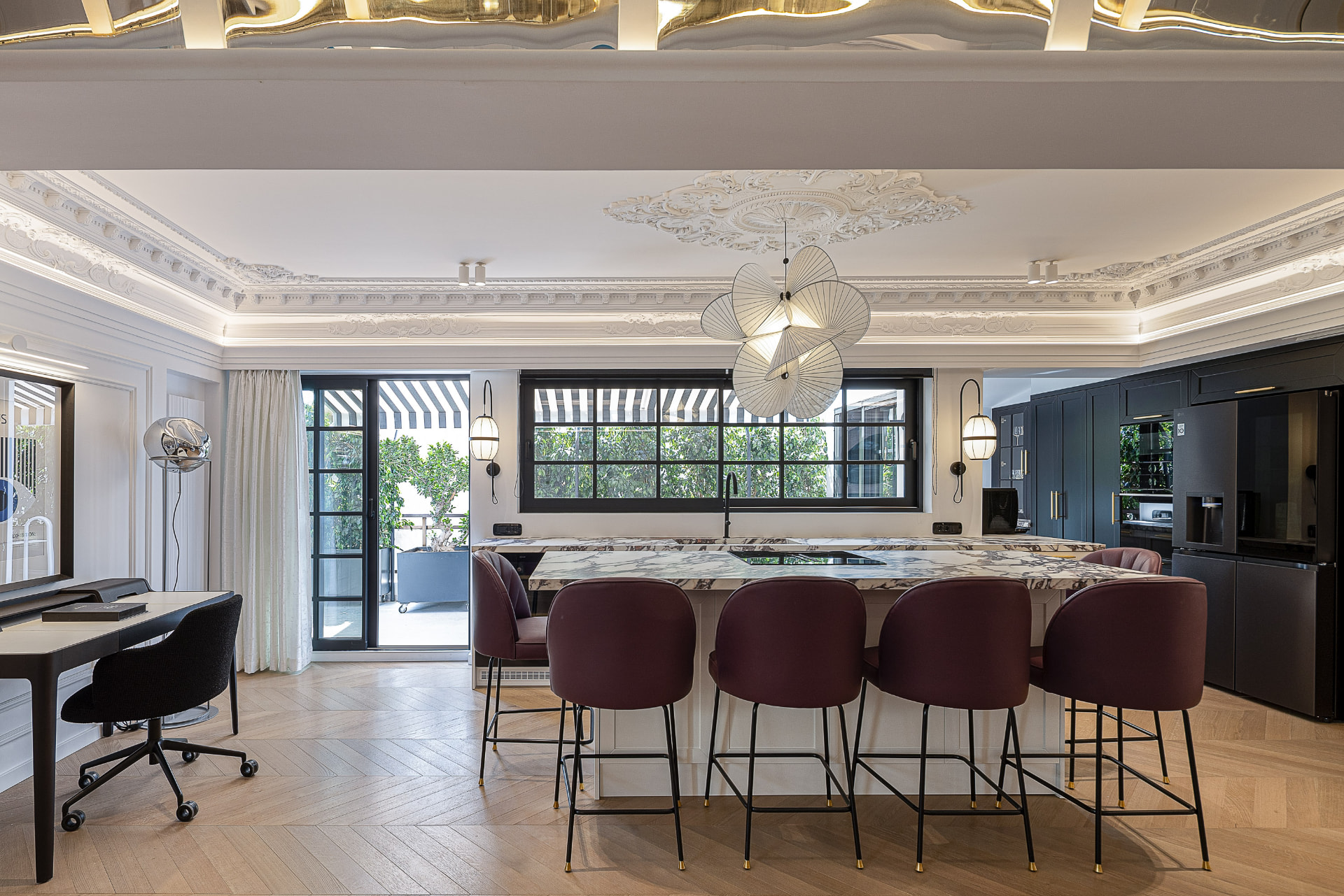 Warmly lit interior with wooden ceiling at the Delfon project designed by Paola Fouraki